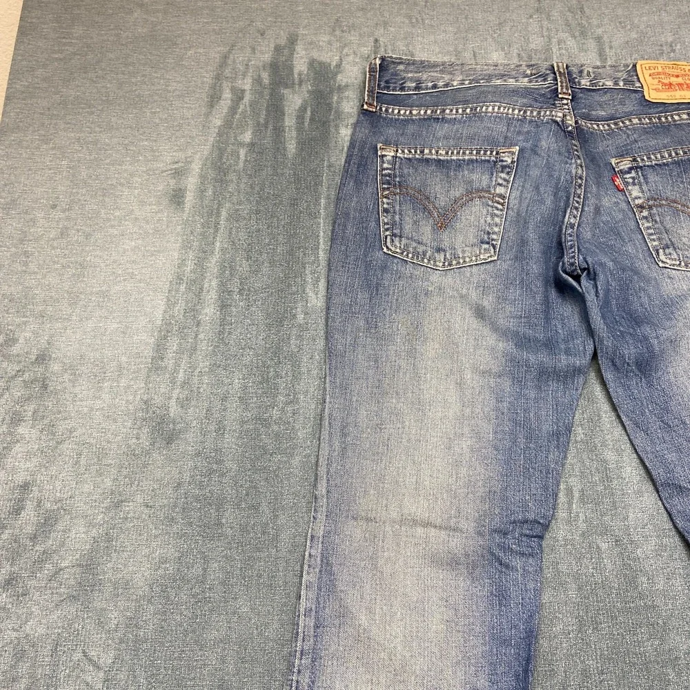Vintage Levi's 569 Jeans Women 03 30x32 Blue Denim Medium Wash Flare Leg Raw Hem